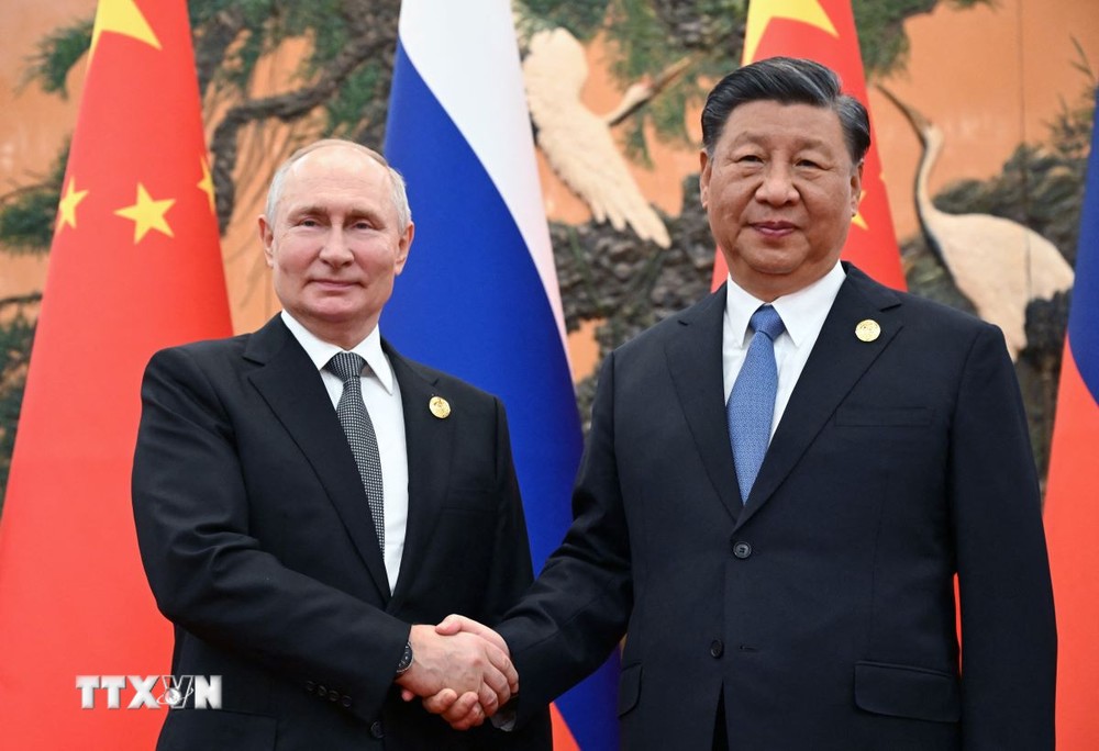 Chủ tịch Trung Quốc Tập Cận Bình (phải) và Tổng thống Nga Vladimir Putin tại cuộc hội đàm ở Bắc Kinh, Trung Quốc, ngày 18/10/2023. (Ảnh: AFP/TTXVN)