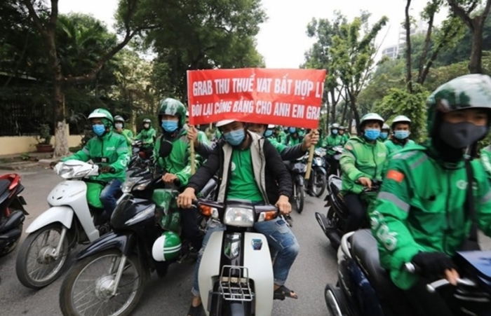 Tổng cục Thuế lên tiếng vụ Grab tăng cước, phí lên lái xe